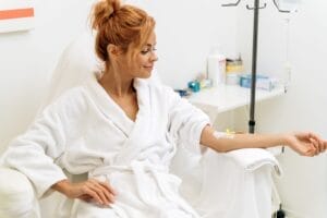 Woman getting the mental and physical benefits of NAD+ IV Infusion therapy